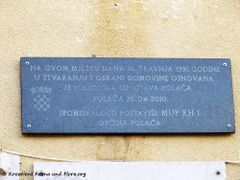 Inschrift am Gebäude der Gemeinde, 01/2017